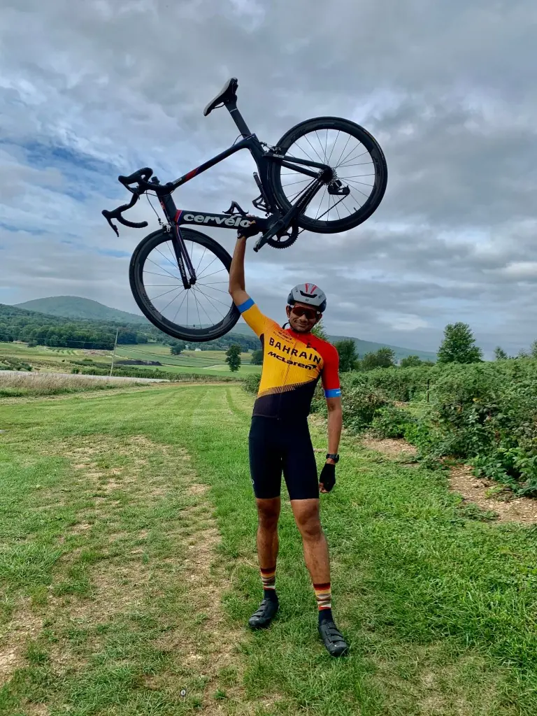 Celebrating with the bicycle overhead